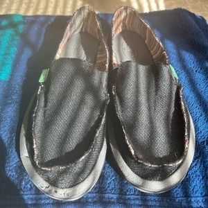 Brand new size 7 black Sanuk Women’s slip on canvas shoes